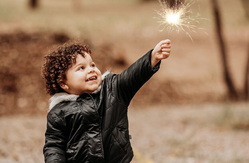 a boy with sparklers living a purpose driven life